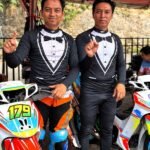 Roby Harmoko dan Siswanto Anto Jaya berpose bersama motor balap di paddock Final Superprix 2026 Sirkuit Mijen Semarang.