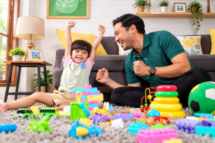 Ayah dan anak bermain mainan warna-warni bersama di ruang keluarga dengan suasana ceria.
